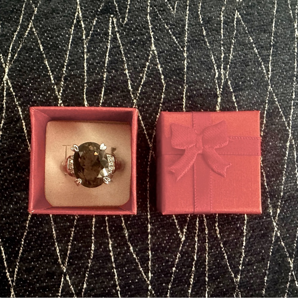 Judith Ripka  smoky quartz ring in silver plated metal.